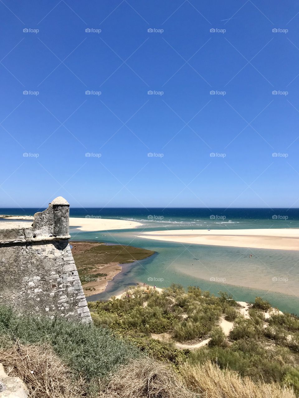 Cacela Velha fortress overlooking the easternmost lagoon of the Ria Formosa (a system of barrier islands that communicates with the sea through six inlets).