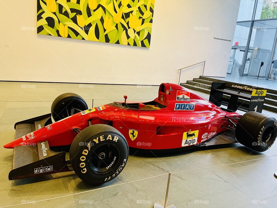 Formula 1 car, the Ferrari 641, on display at MOMA (Museum of Modern Art)  The Formula 1 Racing Car is designed for a single purpose: to win the Grand Prix, a series of sixteen races held each season in different parts of the world. Debuted in 1990. 