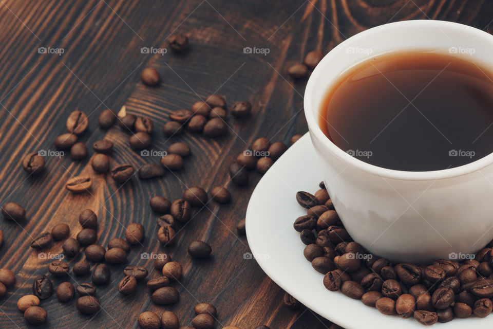 coffee cup on wooden rustic table.  morning ritual concept