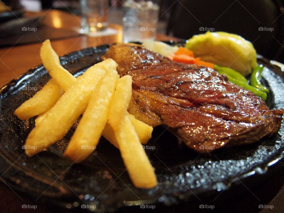 Pork steak with potato french fries