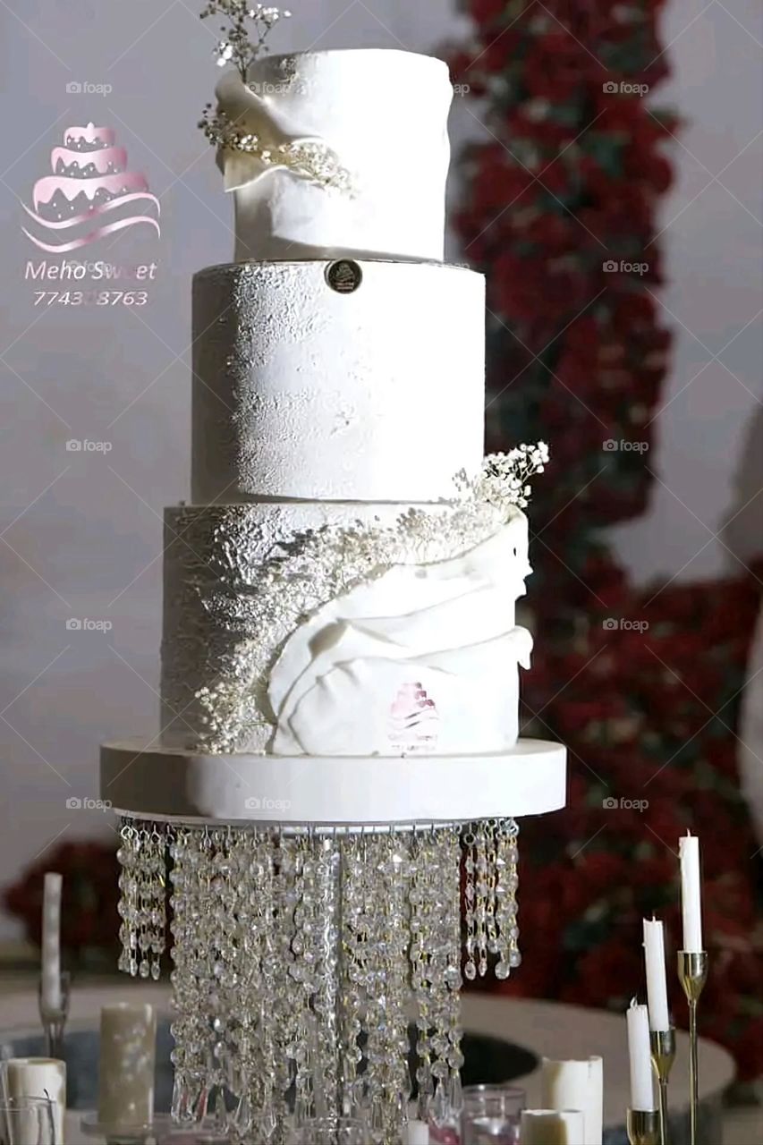 A very beautiful picture, and there is no better picture than it. There is no better picture of green herbs and colorful, red and white roses than it. Glory be to God, the natural and picturesque view, and there is no more