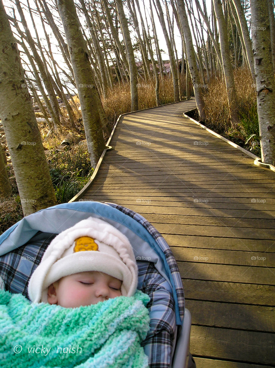 My kind of relaxation! Taking my baby girl for a walk on the boardwalk by the seashore. Looking at her beautiful angelic face as she naps & at the golden hour sun shine through the trees was so peaceful & serene. Perfect moment captured.