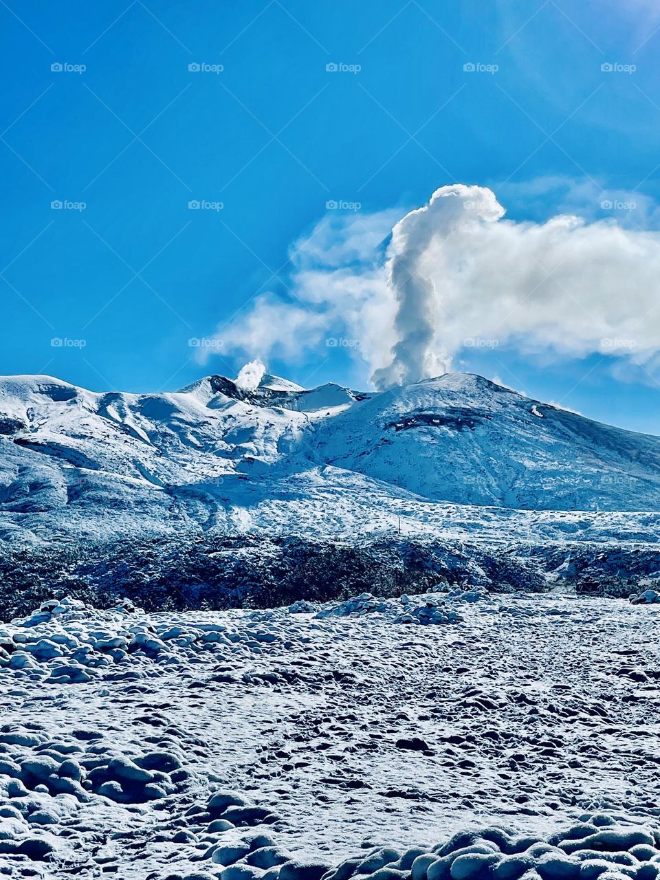 Snowing on mountain