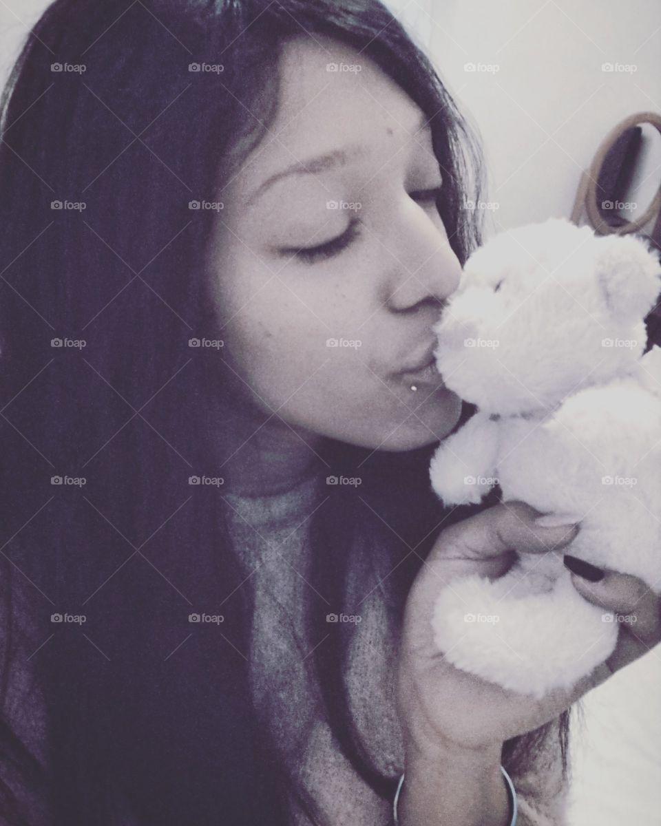 goodnight kiss to pink teddy bear