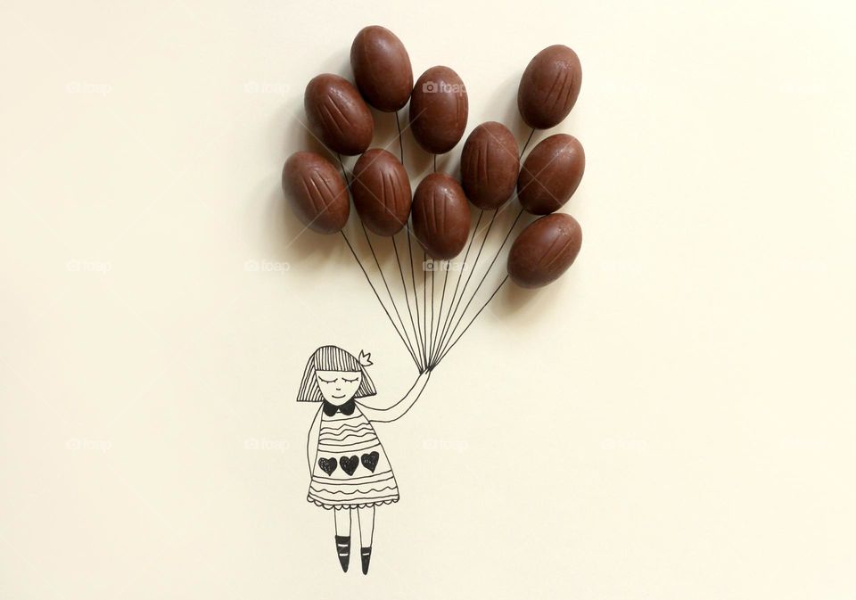 Chocolate Easter eggs balloons and illustration