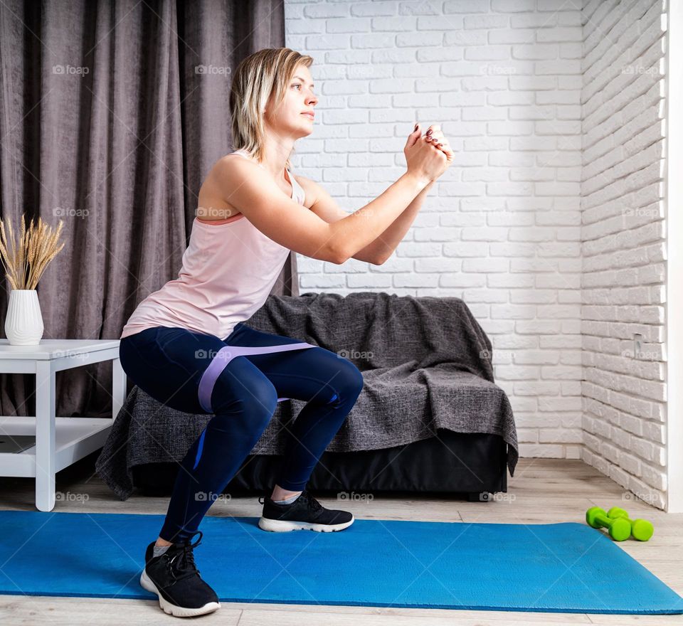 woman working out at home