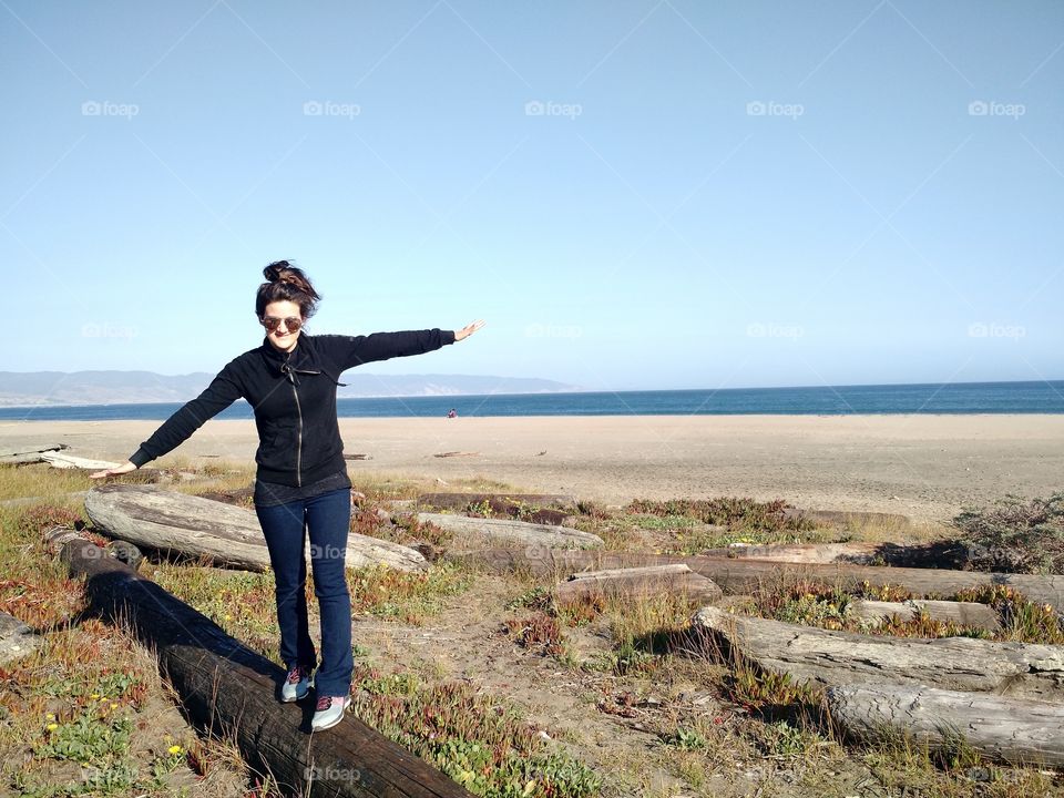 balancing on a log. California