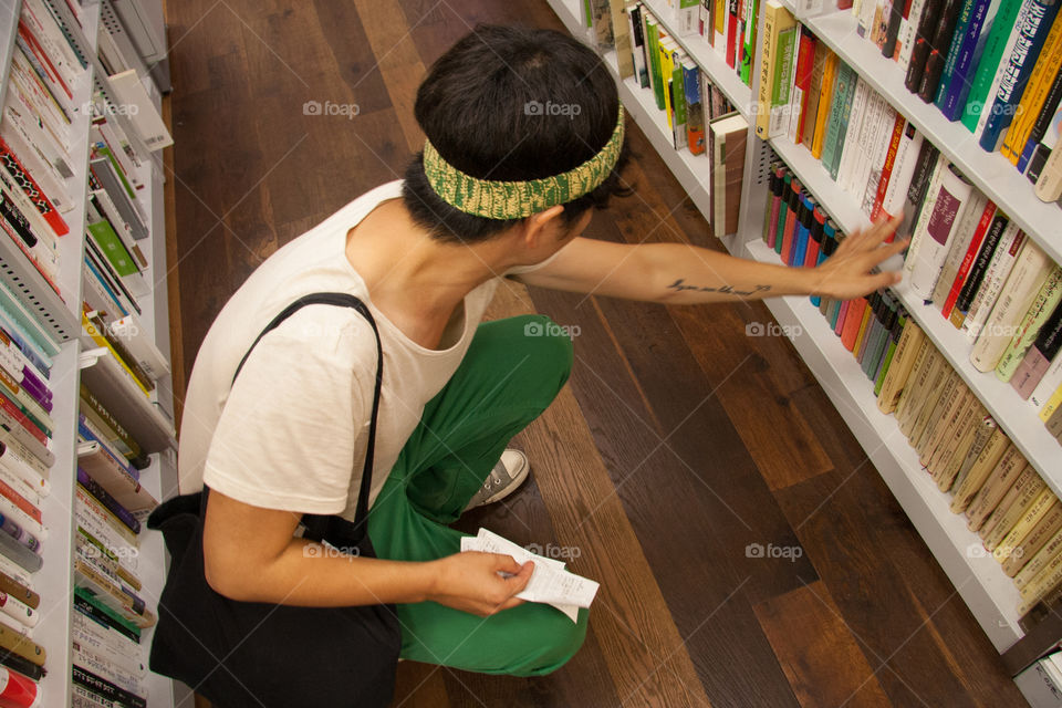 Searching for a book in the bookstore