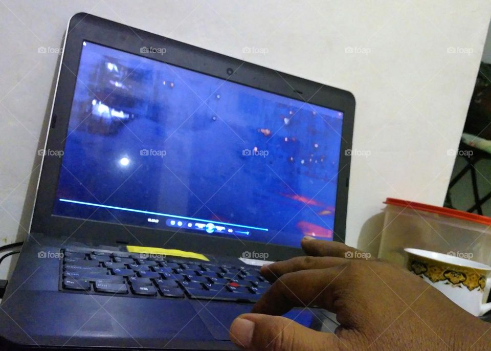 Watching movie on laptop