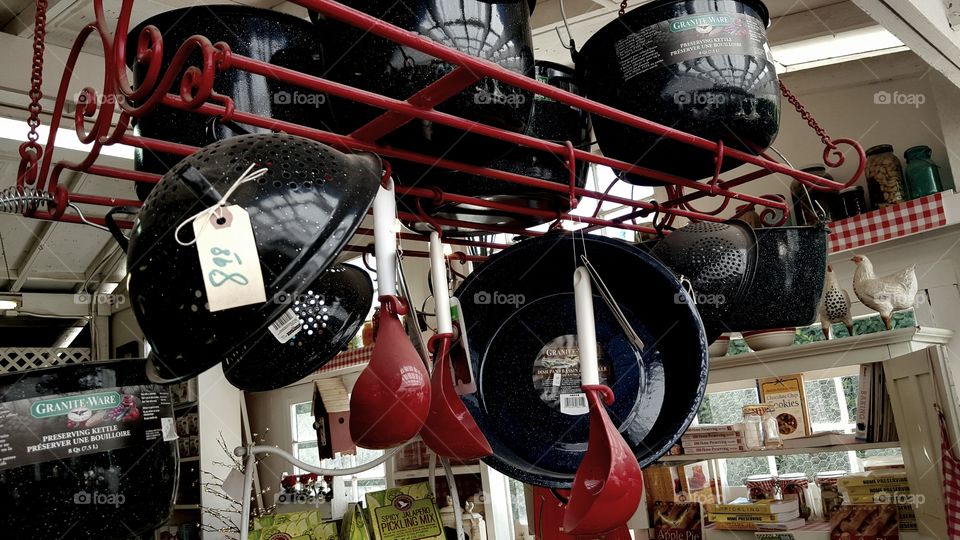 pots hanging from rack