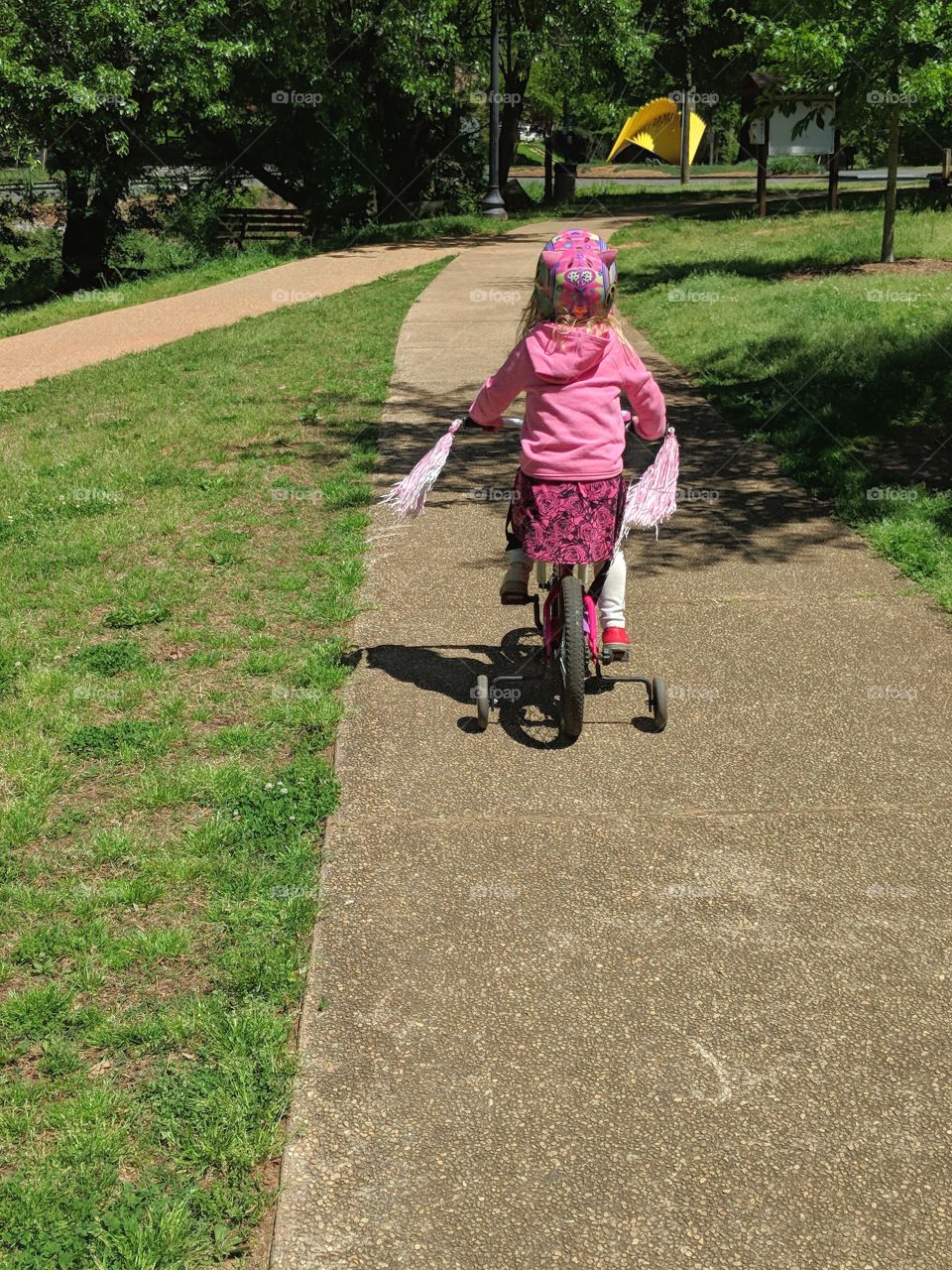 child riding bike to destination