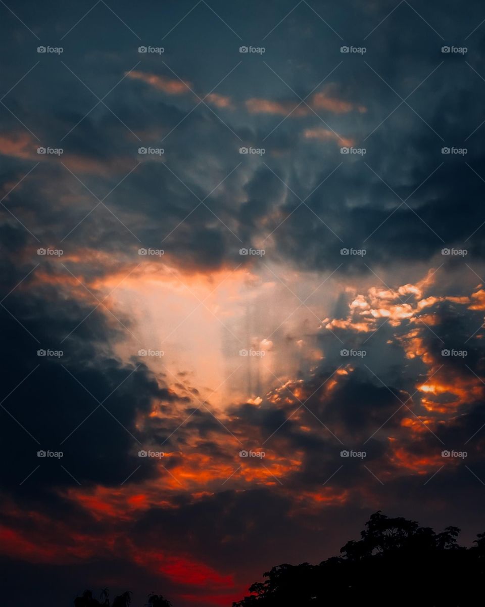 Sun behind the clouds 