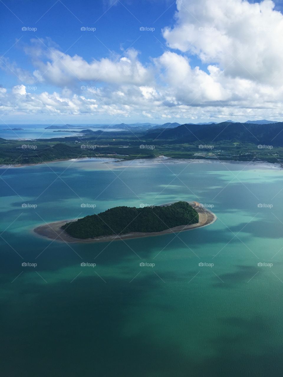 Window view of some of the islands prior to landing in Phuket international airport 