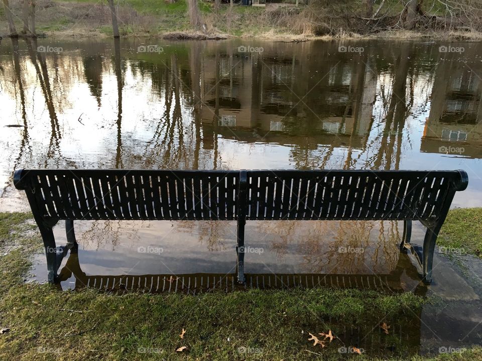 Flooded park bench