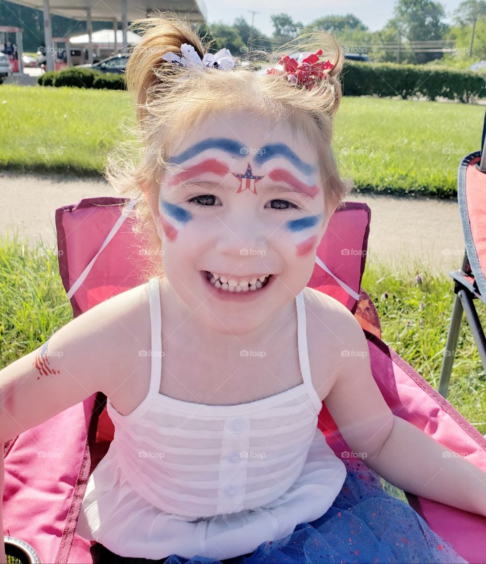 4th of July, face paint, patriotic,  red, white, blue,  parade,  kids camping chair,  smiles,  pigtails,  stars and stripes,