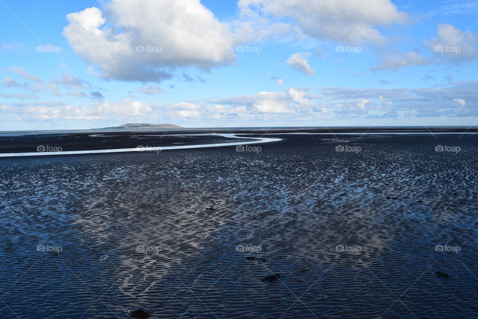 View of sea against cloudy sky