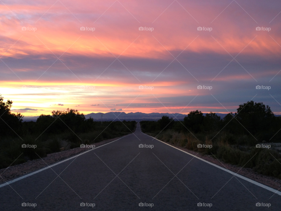 faro santa pola sunset carretera red sky road by iC