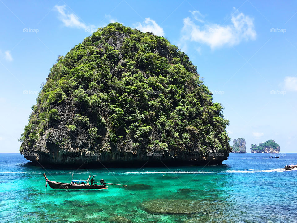 Summer travel to tropical thai islands by boat 