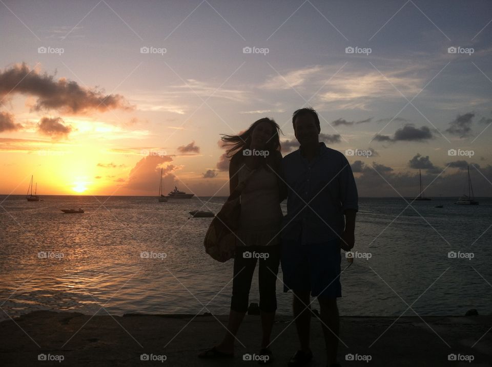 Silhouette of couple at sunset in saint Maarten 