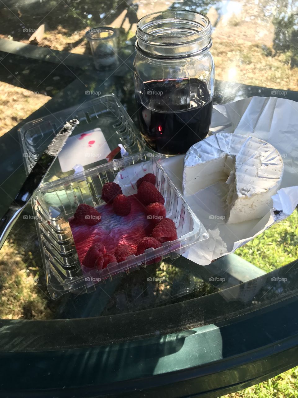 Simple dinner. Brie. Raspberries. Wine. 
