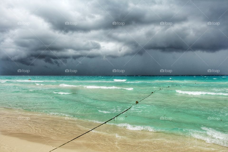 thunderstorm clouds under caribbean sea