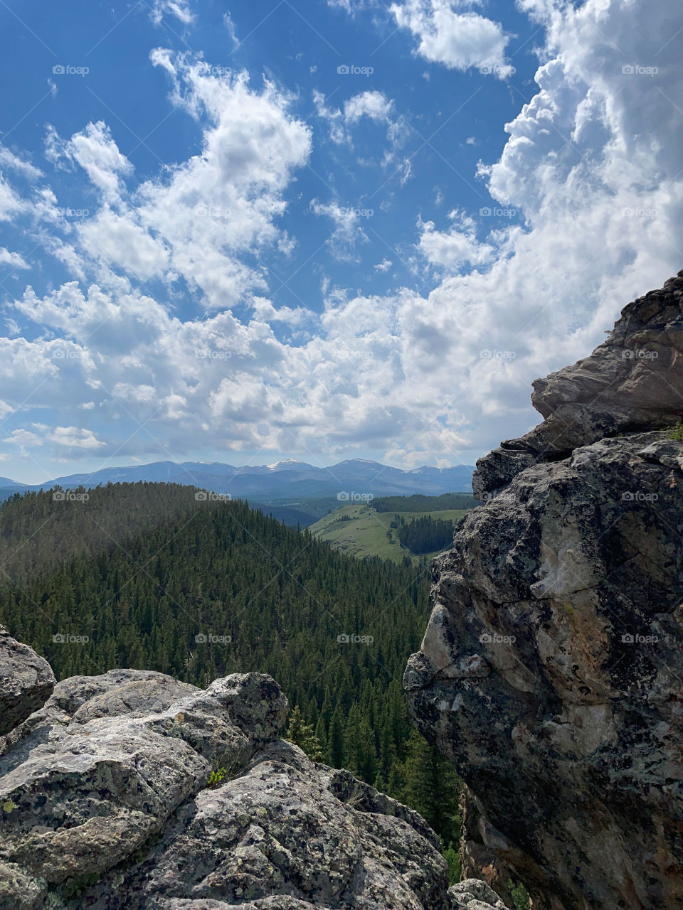 Mountain View rocks trees sky clouds landscape