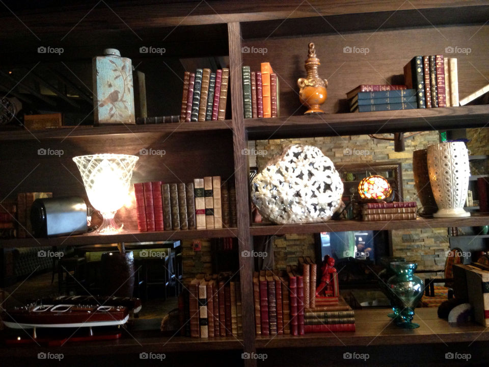 Bookshelf with books and ornaments