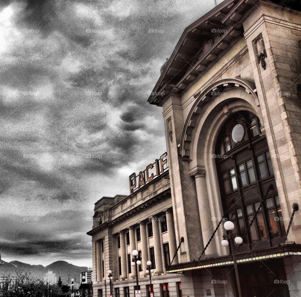 A stormy grey day outside the train station. 