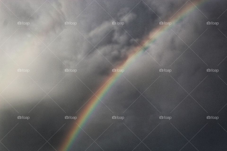 rainbow in the sky afther the rain.