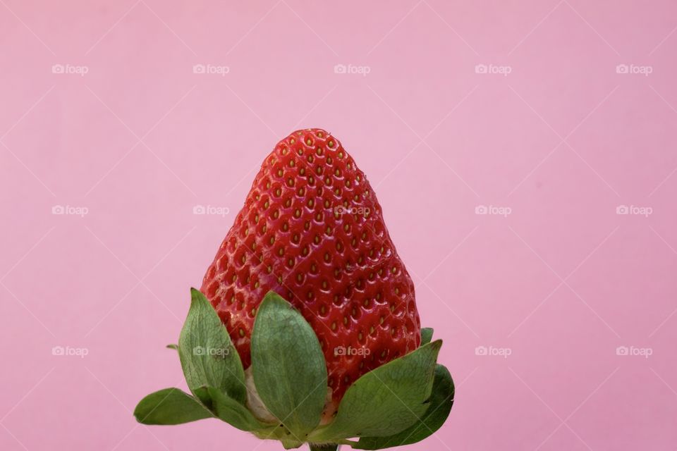 Strawberry with pink background 