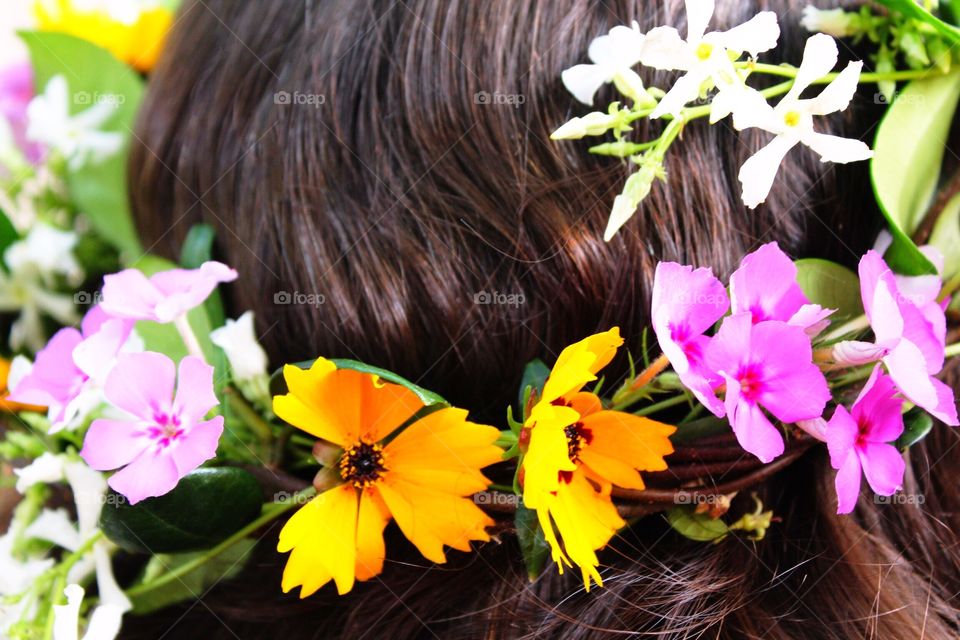 Wearing a flower crown