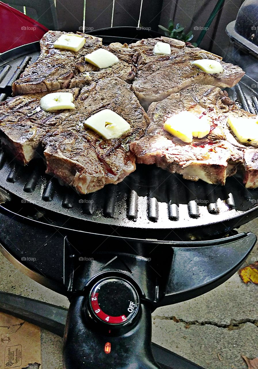 steaks are on the grill