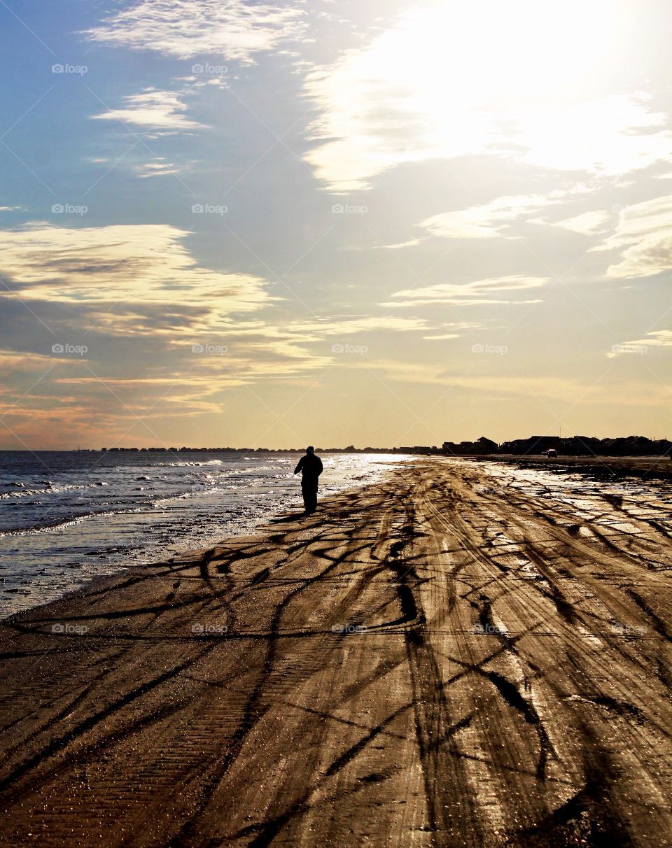 Person walking at beach