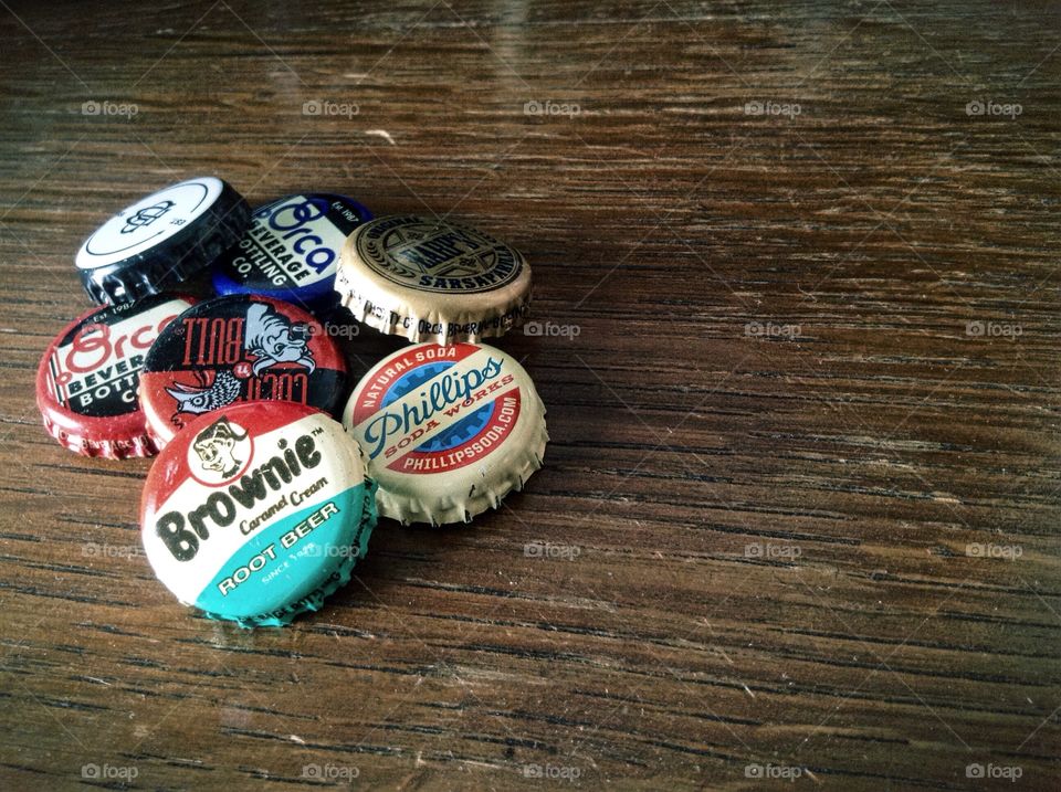 Bottle cap collection on bar