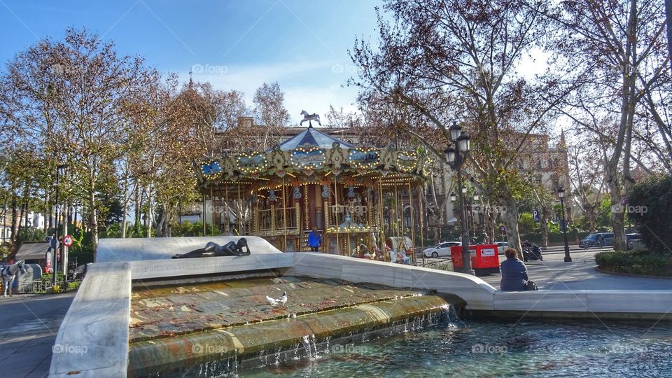 Carousel and font un the city