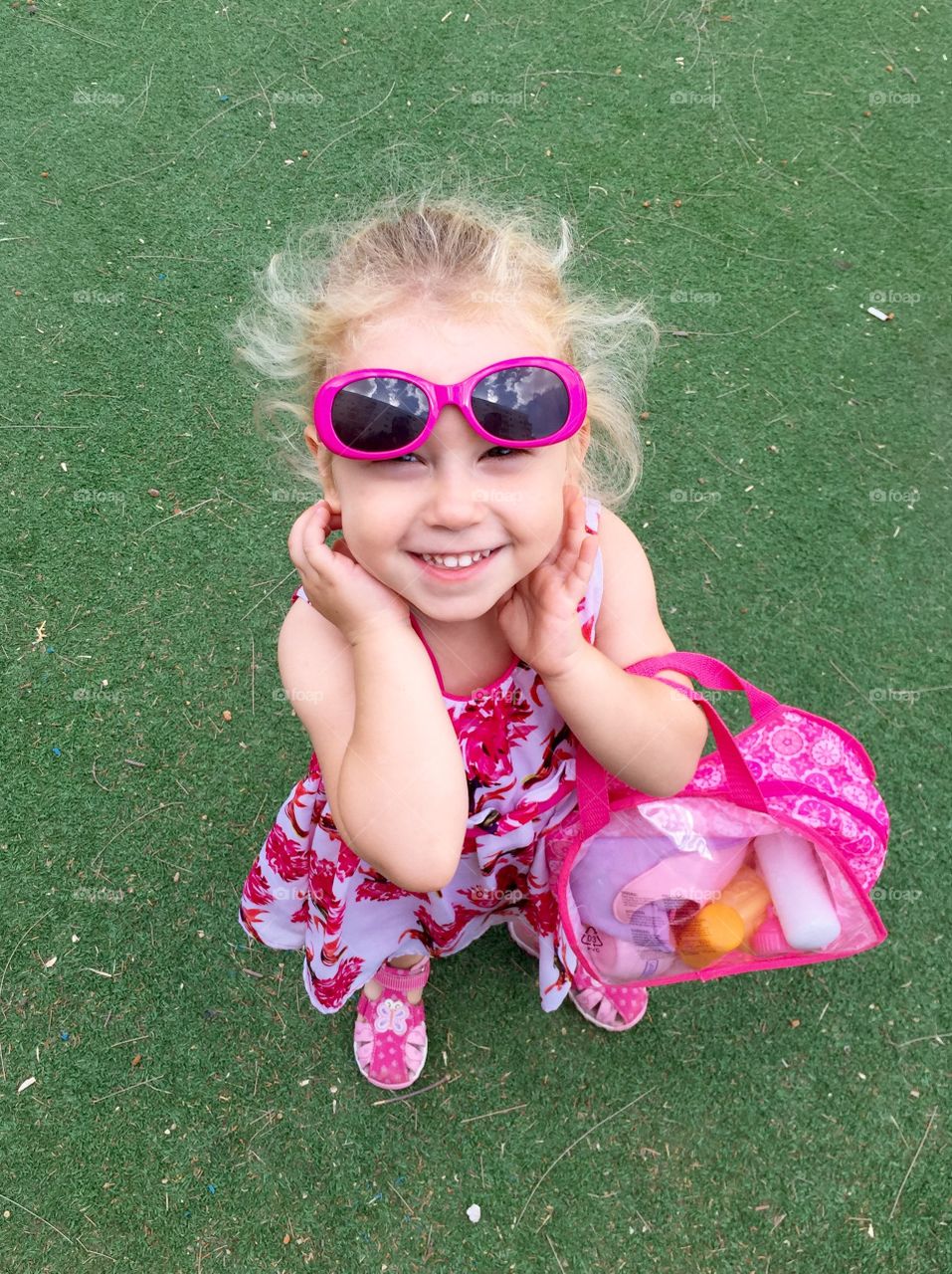 High angle view of small girl with goggles