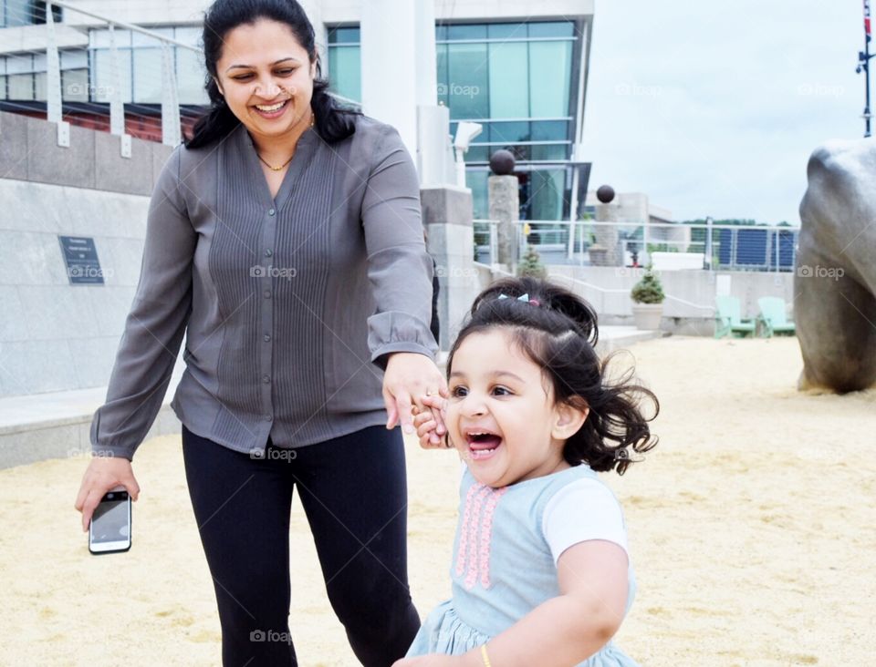 mom playing with daughter 