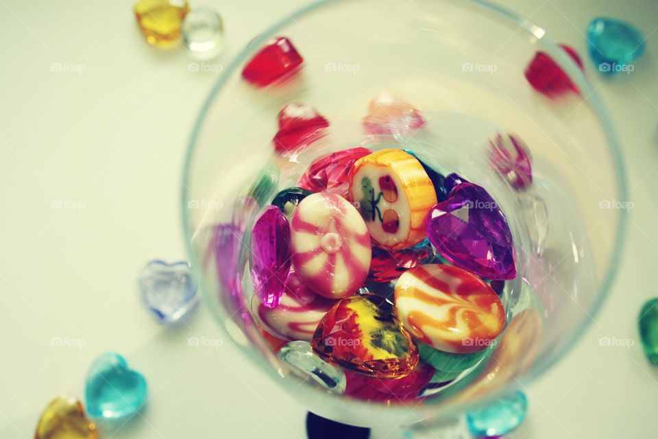 glass with different candies