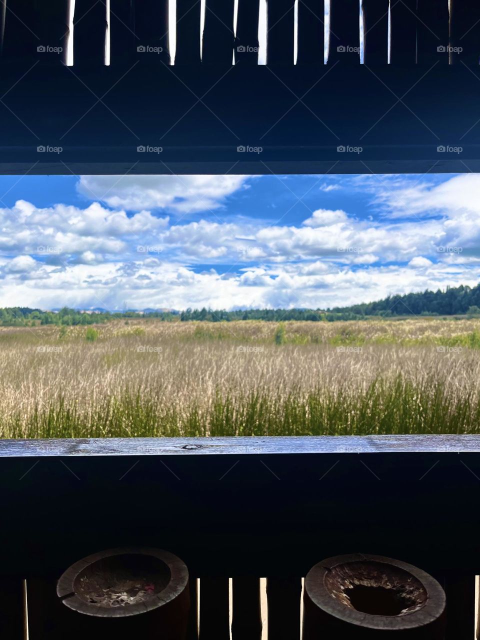 A window looking through to the fields