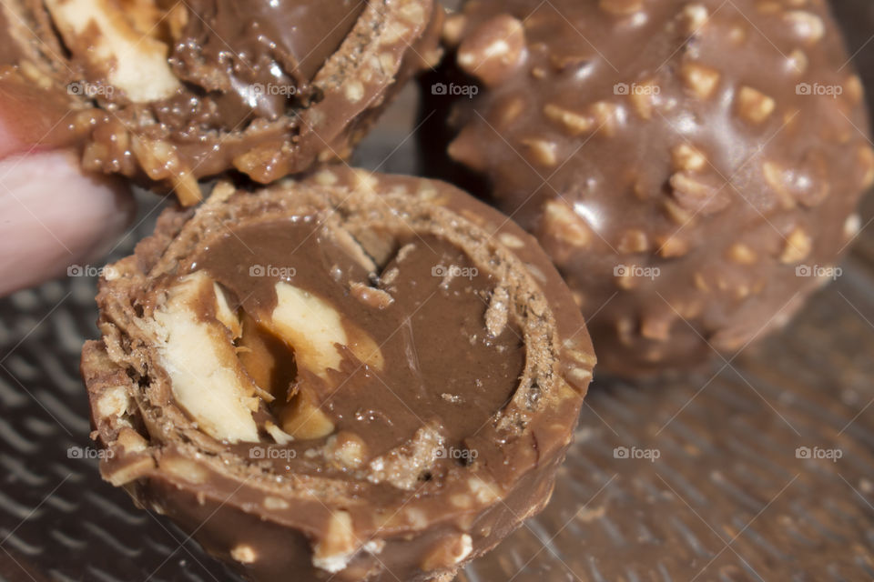 Round chocolate candy with nuts 