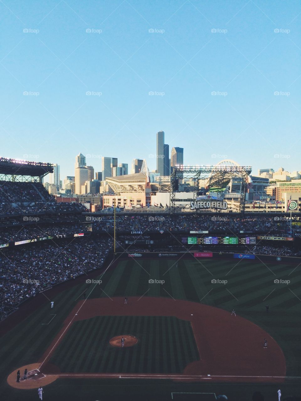 Baseball Season. Seattle Mariners Baseball Game with cityscape in background 