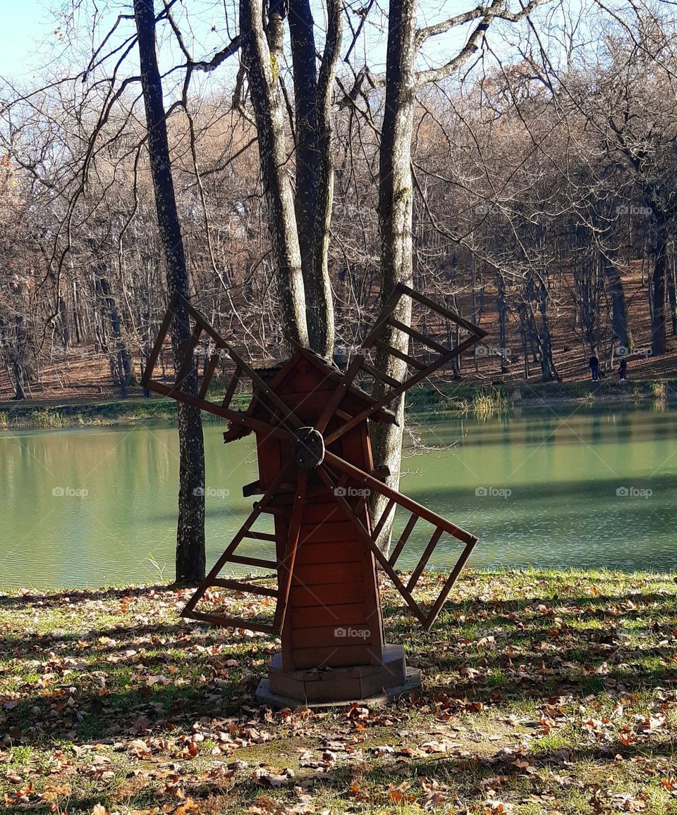 a small wind mill in the park