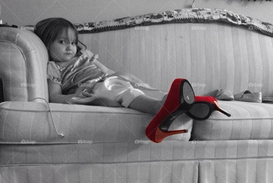 Loves mommy's shoes!