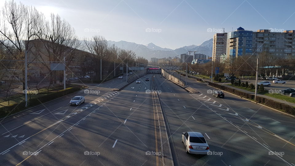 highway in the city going to mountains