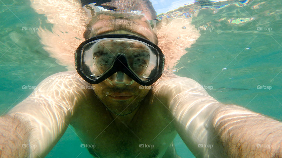 underwater photo big blue sea, man dive