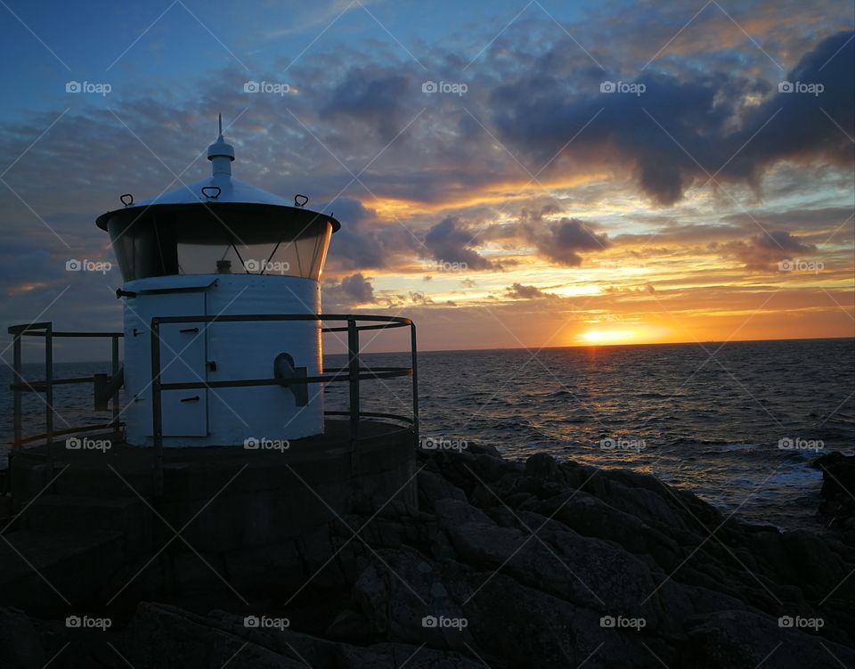 lighthouse before sunset