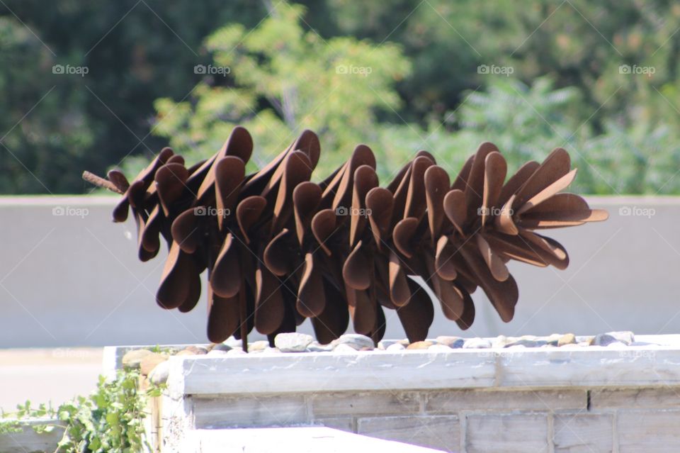 Pine cone metal sculpture 