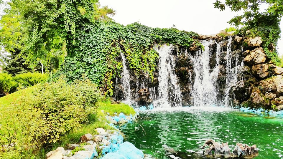 watelfall. I took this photo in a park close to my home in Ankara, Turkey. Artificial waterfall in beautiful in the centre of a big