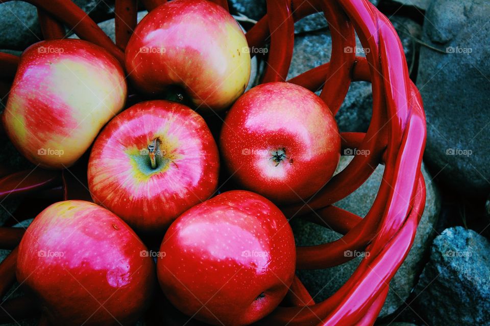 Ripe apples in basket