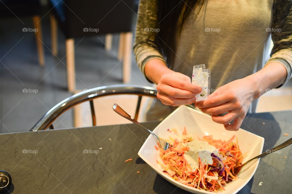 Mid section of women preparing food